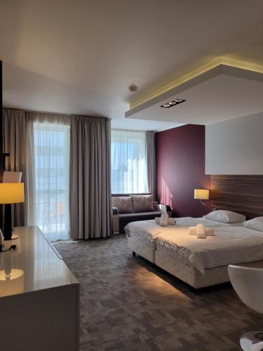 Ένα ή περισσότερα κρεβάτια σε δωμάτιο στο Diva Resort