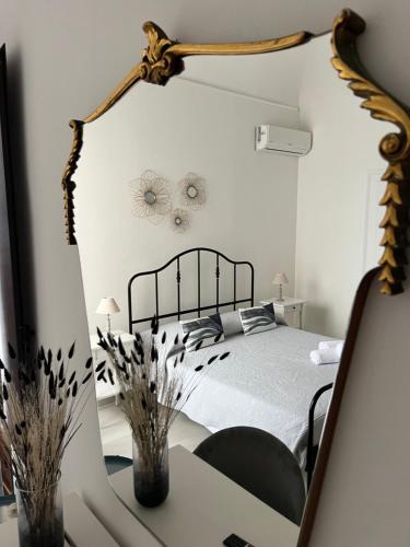 Letto o letti in una camera di Casanova Rooms and Apartment to Rent
