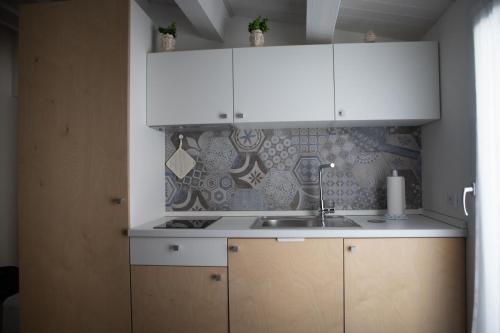 A kitchen or kitchenette at CASA MAIOLICA