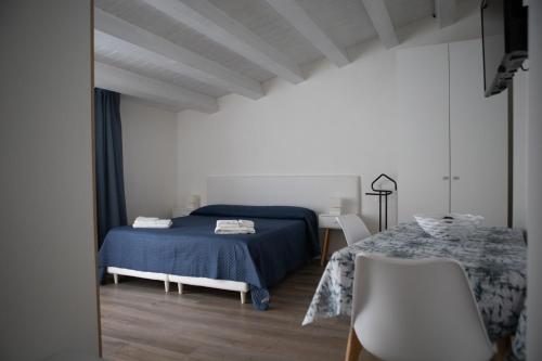 A bed or beds in a room at CASA MAIOLICA