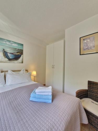Ένα ή περισσότερα κρεβάτια σε δωμάτιο στο Apartments Silva with a view of sea