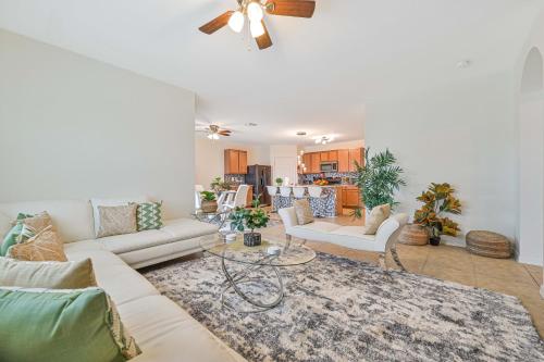 a living room with a couch and a table at VILLA AWESOME! in Cape Coral