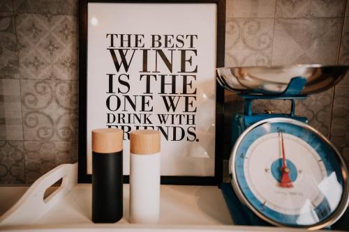 a sign that says the best wine is the one we drink with impeds at SOONWALD Apartment mit Garten & Hot Tube in Stromberg