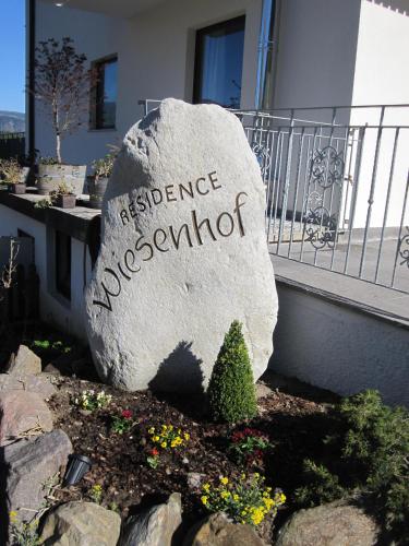 a rock with the words no science observatories written on it at Residence Wiesenhof in Vollan