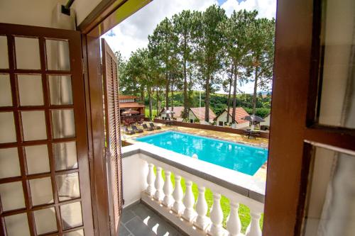 Kolam renang di atau dekat dengan Hotel Dona Paschoalina