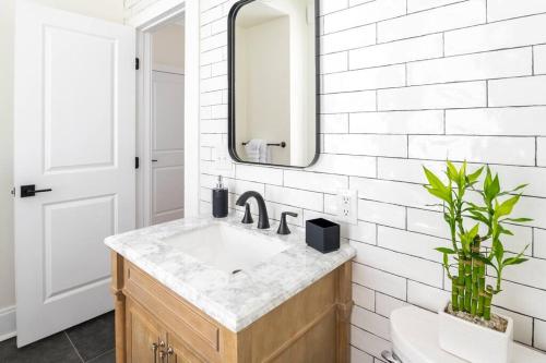 a bathroom with a sink and a mirror at Entire Home in Newport in Newport