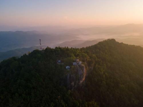 an aerial view of a hill with trees on it at Green Acres Leisure Resort & Spa in Kandy