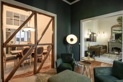 a living room with green walls at Libest Sintra - Casa do Palácio in Sintra