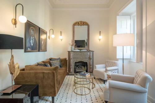 a living room with two couches and a fireplace at Libest Sintra - Casa do Palácio in Sintra