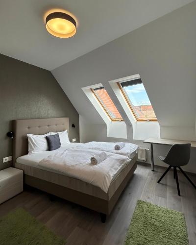 Un ou plusieurs lits dans un hébergement de l'établissement Fibula Residence Hotel & Wellness - Adults Only