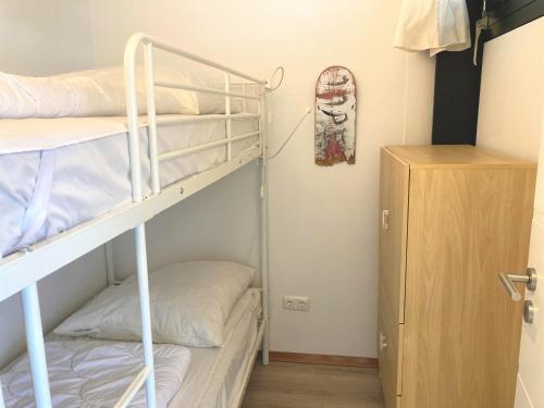 Postel nebo postele na pokoji v ubytování Ferienpark Sierksdorf App 91 - Strandlage