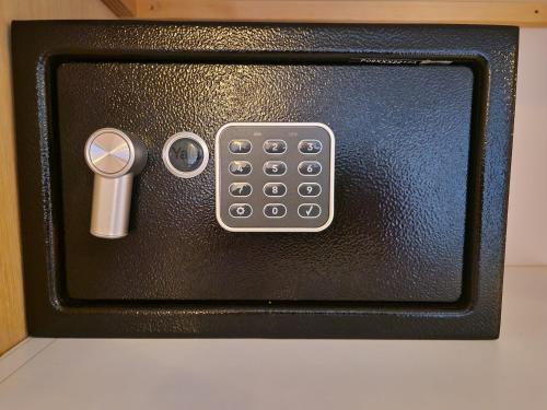 a remote control sitting on top of a counter at Primroses, Wood Farm in Shipdham