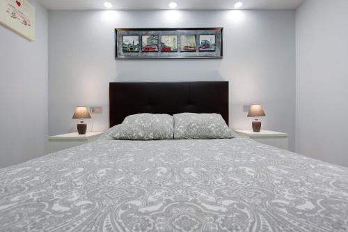 Кровать или кровати в номере Apartamento 7 dioses
