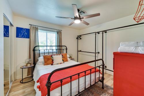 a bedroom with a bed and a ceiling fan at Yuma Vacation Rental with Private Pool and Patio! in Yuma