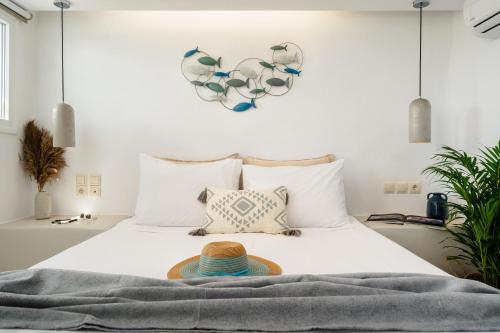 Giường trong phòng chung tại Santo Concept Luxury Villas
