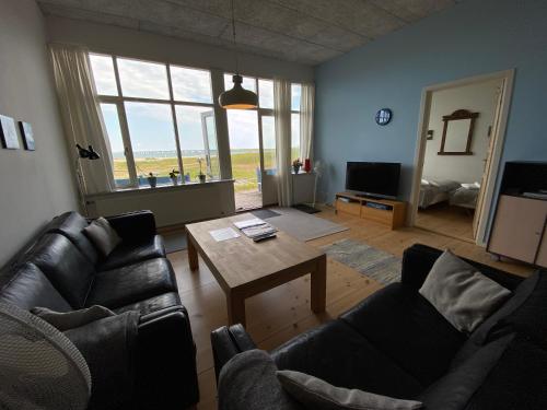 Część wypoczynkowa w obiekcie Skærven Beachfront Apartments and Cottage