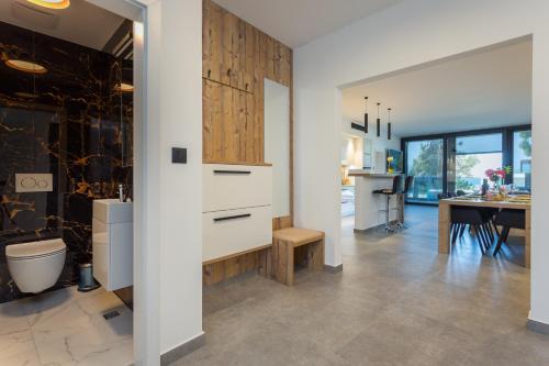 Køkken eller tekøkken på Fortuna Deluxe Apartment