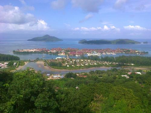 an aerial view of a small island in the water at Elegant Villa with Sea View in Victoria in Victoria