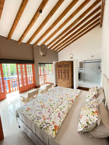 Postel nebo postele na pokoji v ubytování Finca Hotel Guadalupe