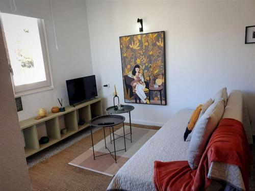 TV a/nebo společenská místnost v ubytování somriu Apartament Fenals Platja