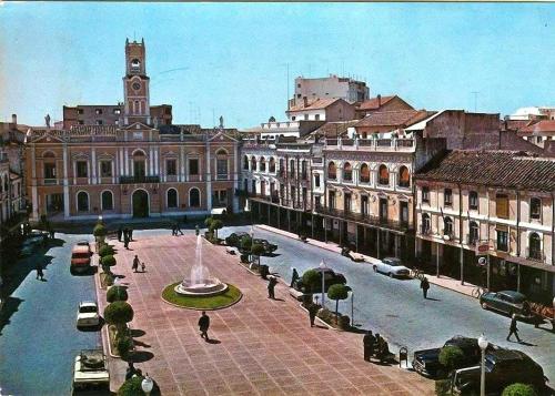 a city with a fountain in front of a building at 2 bedrooms apartement with city view balcony and wifi at Ciudad Real in Ciudad Real