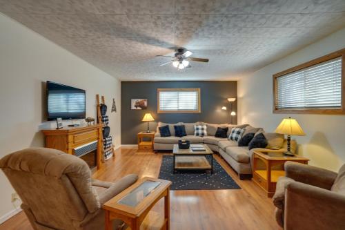 a living room with a couch and a tv at Badlands Suite Less Than 1 Mi to Teddy Roosevelt Park! in Medora