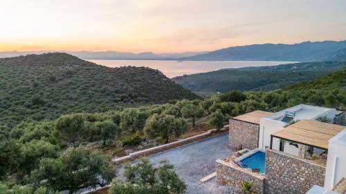 an aerial view of a villa with a swimming pool at Casatino Villas in Kalianeika