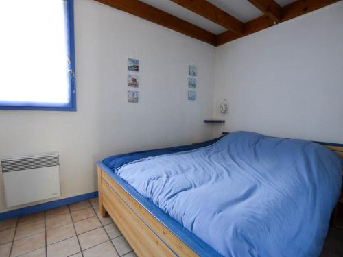 Postel nebo postele na pokoji v ubytování Maison La Palmyre, 3 pièces, 6 personnes - FR-1-705-41