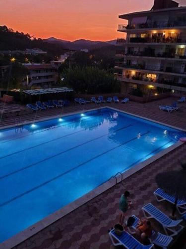 Bazén v ubytování Fantástico apartamento con piscina en Tossa de Mar nebo v jeho okolí