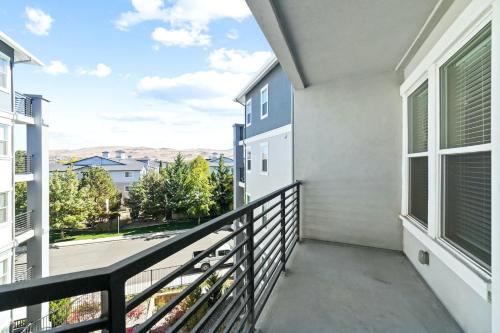 a balcony with a view of a street at Sparks 1BR Water Views · Spring & Rooftop Patio in Sparks