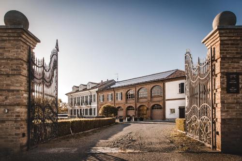 an entrance to a building with an iron gate at Villa Adelaide Relais & Wine in Calamandrana