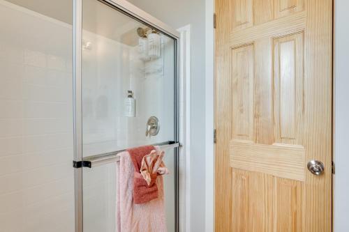 a bathroom with a shower with a glass door at Bullhead City Vacation Rental with Resort Pool! in Bullhead City