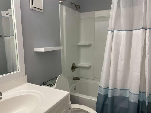 a bathroom with a sink and a toilet and a shower at Gulf Shores Plantation 4307 by ALBVR - New Upgraded Condo and Building - Great Amenities in Gulf Highlands