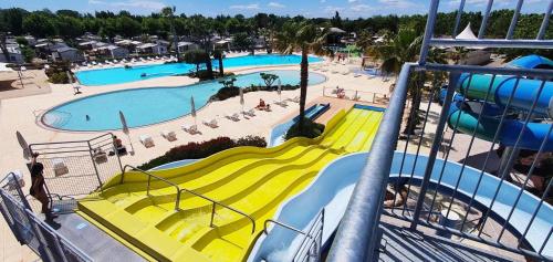 an aerial view of a water park with a slide at Mobil-Home Clos 14 à VIAS in Vias