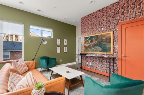 a living room with a couch and a table at Mason Lofts at West End in Nashville