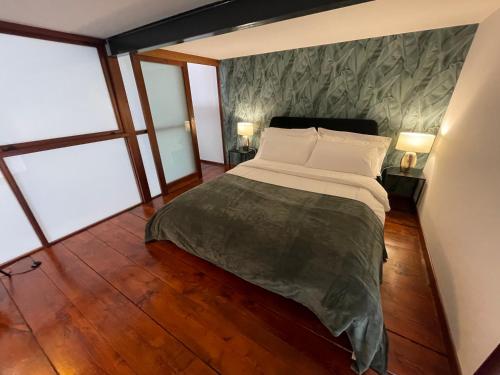 Un pat sau paturi într-o cameră la Residence Bruno