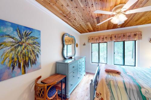 a bedroom with a bed and a ceiling fan at Spa on Port Royal Sound 1321 in Hilton Head Island