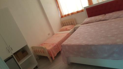 Postel nebo postele na pokoji v ubytování Villa-Hotel Ludianna