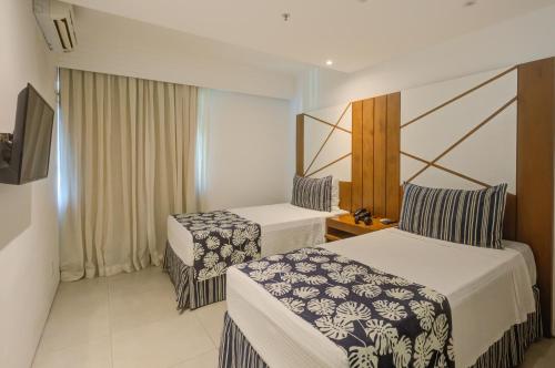 Rio Design Copacabana Hotelにあるベッド