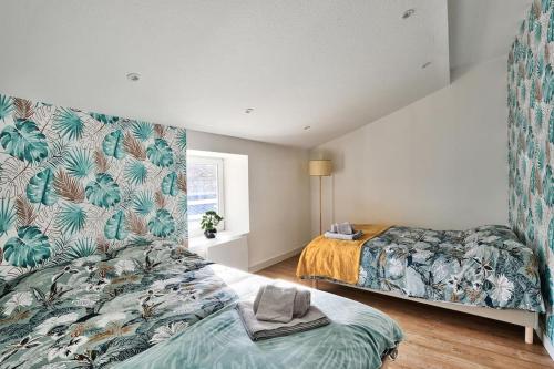 Postel nebo postele na pokoji v ubytování appartement Karibu à Lagnieu