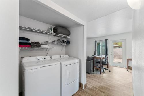 a laundry room with a washer and dryer at Coolidge 3bd 2ba upgraded apartment with amenities in Coolidge
