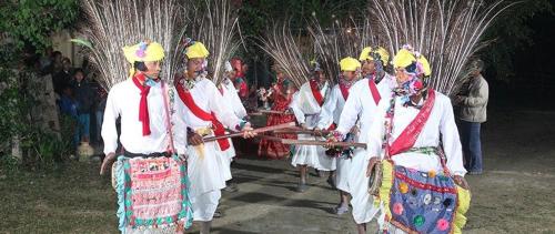 a group of people dressed up in traditional dances at Bardia Wild Side Hotel in Bhurkīā