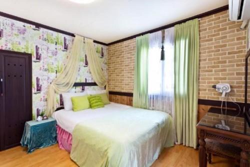 Katil atau katil-katil dalam bilik di Montblanc Pension