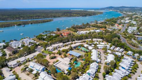 an aerial view of a resort next to a river at Sun Drenched Unit in Noosaville in Noosaville