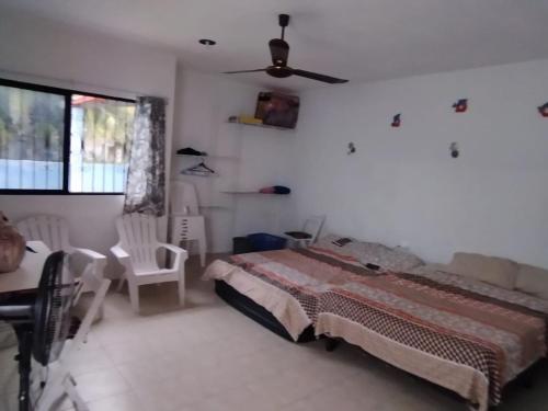 Posteľ alebo postele v izbe v ubytovaní casa en playa santa clara yucatan