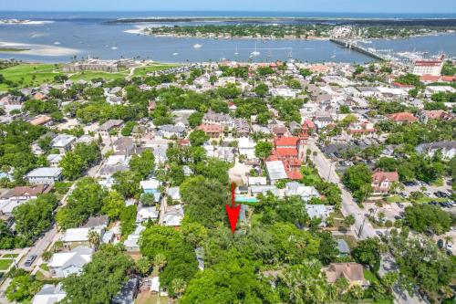an aerial view of a residential neighborhood with a red arrow pointing to a suburb at Flagler Cottage - 1 Block to Historic District in St. Augustine