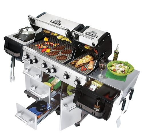 a grill with food and a plate of food at Buddha Mansion Luxury Resort - 8BR Modern, HotTub, Huge pool, Sauna, BBQ grill, Game Room in Las Vegas
