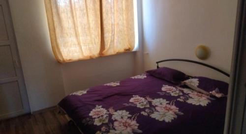 Ένα ή περισσότερα κρεβάτια σε δωμάτιο στο Down Town Timisoara