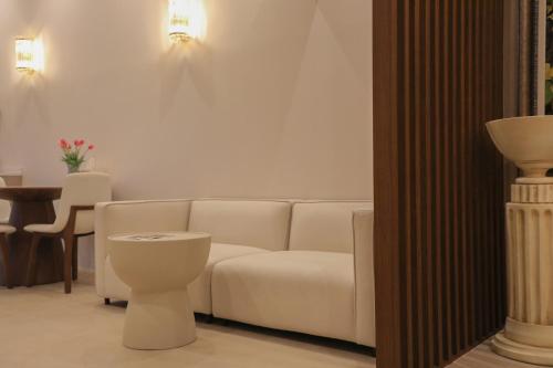 a living room with a couch and a table at Jeonju Hanok Village, Maison14 in Jeonju