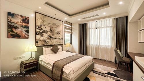 Giường trong phòng chung tại FLC villa golf & resort view Ha long bay